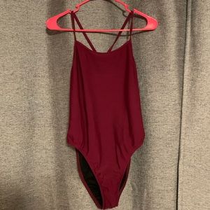 NWOT Jolyn Perry onesie in cabernet. Size 36